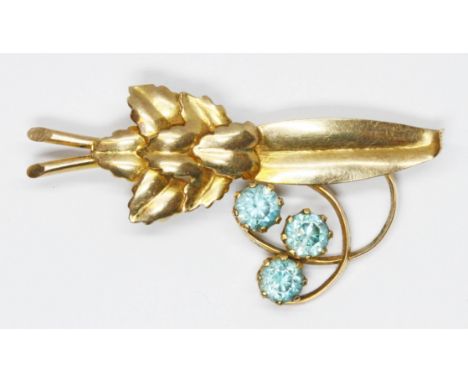 A vintage blue zircon floral brooch, indistinctly marked, length 49mm, gross weight 6g.  Condition - tip of leaf bent, otherw
