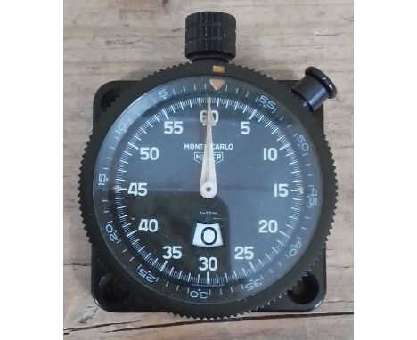 A 1960s plastic cased Heuer Monte Carlo dashboard timer stop clock.  Condition - appears to be working correctly.