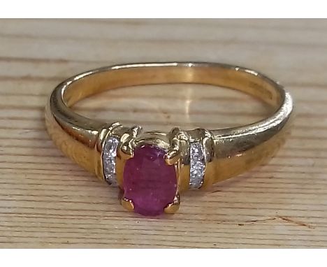A ruby and diamond ring, international convention marks, gross weight 2.6g.  Condition - band slightly bent and thin, general