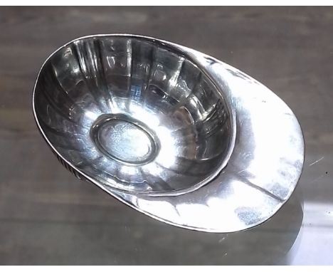 An Elizabeth II novelty silver caddy spoon modelled as a jockey's cap, Thomas Bradbury &amp; Sons Ltd, Sheffield 1963, length