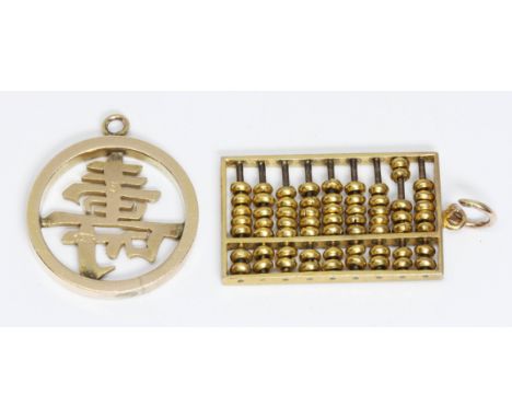 Two charms marked '14K', one modelled as an abacus and the other Chinese characters within border, length 27mm &amp; 21mm res