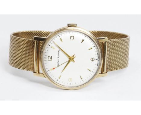 A hallmarked 9ct gold Smiths Astral wristwatch, case diameter 34mm, manual wind movement, Leyland Motors presentation inscrip