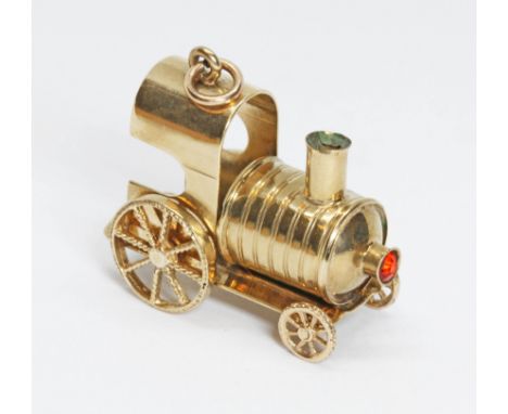 A 9ct gold charm modelled as a steam engine, sponsor 'Zld', London 1964, length 34mm, weight 7.2g.  