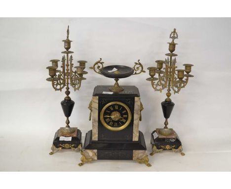Late 19th or early 20th Century black slate, marble and glass clock garniture, comprising a central clock in architectural ca