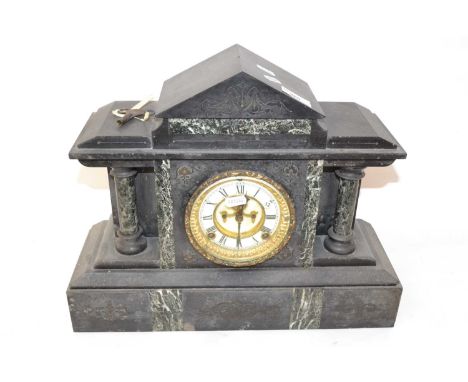A Victorian black slate and marble cased mantel clock of architectural form fitted with a brass movement