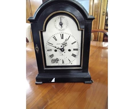 A bracket clock by John Walker of London in ebonised wooden case 32cm high  Poor condition.Paint flaking on the dialMovement 