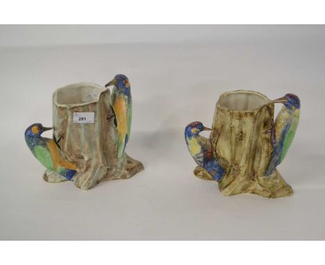 Two Radford vases modelled as tree trunks with woodpeckers