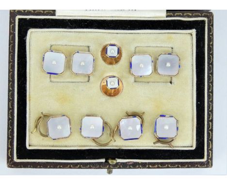 Antique 9ct gold and pearl gentleman's cufflink and shirt stud set in fitted case. Each piece marked 9ct. Some loss to enamel