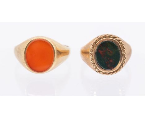 Two 9ct gold signet rings. One set with bloodstone, surrounded by twisted wire, size R. The other a carnelian set ring, size 