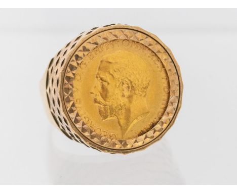 A George V half sovereign ring in a 9ct gold mount. Coin dated 1911. Size R.&nbsp; Approximate gross weight 10.4 grams