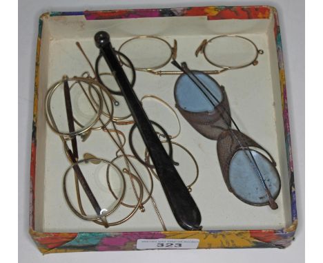A box of vintage spectacles including tortoise shell lorgnettes.  