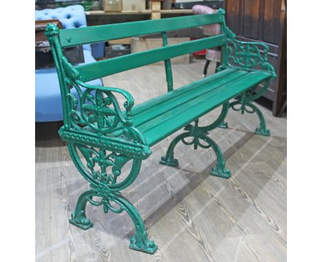 A Victorian cast iron and wooden bench, length 157cm.  