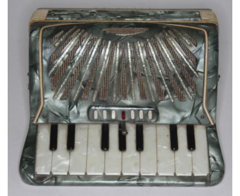 A 1950s novelty fold out musical cigarette box in the form of an accordion.  