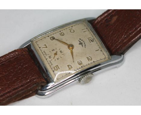 An Art Deco style 15 jewel manual wind Rotary wristwatch in nickel plated case and stainless steel snap back, signed champagn