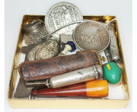 A mixed lot including a pressed amber cheroot holder, a Booth centenary tea caddy, various hallmarked silver and white metal.