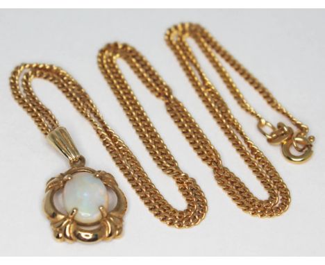 A 9ct gold pendant set with a precious white opal oval cabochon, measuring approx. 9mm x 6mm x 2mm, pendant length 21mm, on 9
