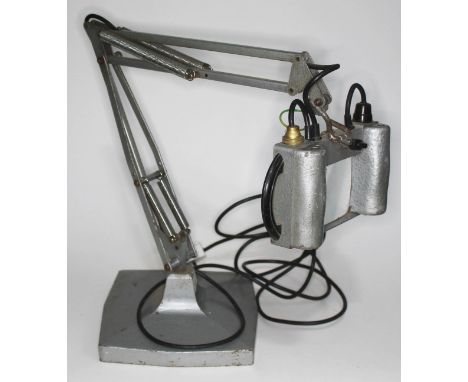 A Herbert Terry &amp; Sons industrial grey anglepoise magnification lamp on weighted square base.  