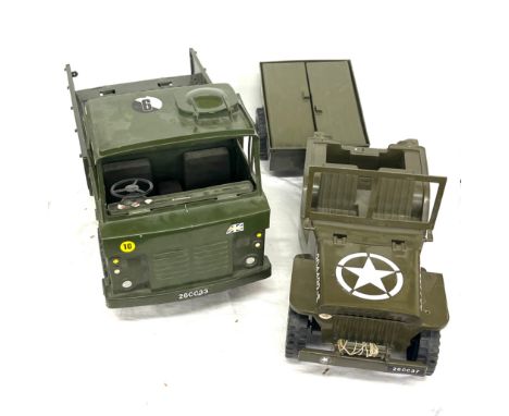 2 Vintage Army trucks, both plastic, largest truck measures approximately 56 x 28cm