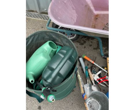 Large selection garden tools to include  wheelbarrow, hand tools, watering cans etc 
