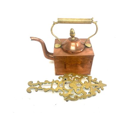 Copper kettle on stand 