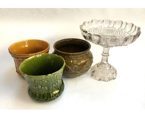 Three ceramic planters; together with a glass bonbon dish on stem 