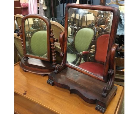 A 19th century adjustable dressing mirror, on bobbin turned supports, 49cmH; together with one other, 59cmH 