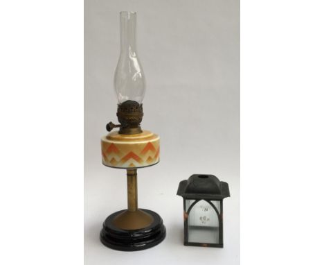 An Art Deco oil lamp with glass chimney; together with an early 20th century lantern 