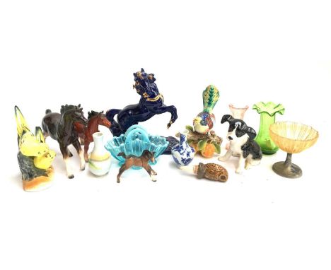 A mixed lot of mostly ceramic figurines to include multiple horse figurines including Beswick foal, a blue and gilt unicorn, 