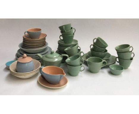 A Woods ware part tea set; together with a quantity of Poole pottery, to include plates, bowls, gravy boat, lidded sugar bowl