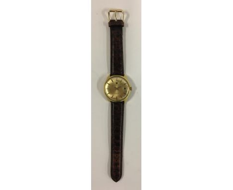 A Tissot Seastar gent's electromechanical steel and gold plated watch, with date aperture, on leather strap, 36m diameter 