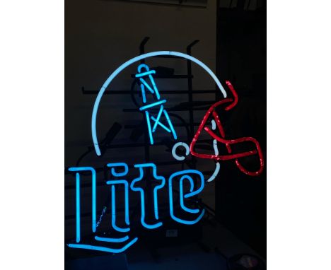 An American neon bar sign 'LITE' below an American football helmet, with a 'step down and step up voltage converter' switchin