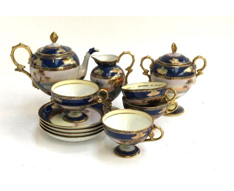 A Noritake tea set, swan lake design, including four cups and saucers, teapot, milk jug and sugar jar 