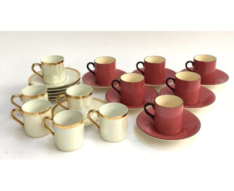 A set of six white and gilt coffee cans and saucers, with lustre finish; together with six pink Solian Ware Soho coffee cans 