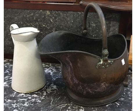 A copper coal scuttle with swing handle; with enamel wash jug, 31cmH 