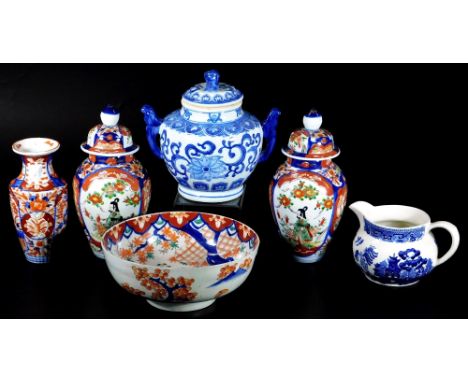 Various Japanese Imari and other pottery and porcelain, comprising of a pair of vases, each with compressed circular lids and