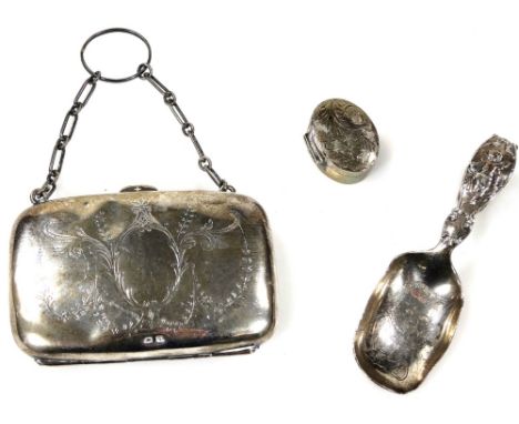 A early 20thC caddy spoon, with engraved bowl and shaped loop handle, marked sterling, 9cm W, an oval patch box similarly mar