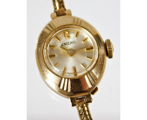 A 9ct gold Enicar cocktail watch, with small oval watch head, with fan design decoration, on articulated bracelet, with safet