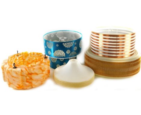 A 20thC Art Deco design light shade, in orange and cream, of shaped form, 28cm W, a further glass light shade and three other