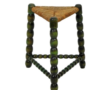 A child's bobbin turned  stool, with rush seat, 41cm H, 33cm W, 28cm D.