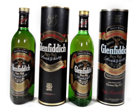 Two bottles of Glenfiddich Pure Malt Scotch Whisky, in cylinder tubes, 31cm H.  (2)