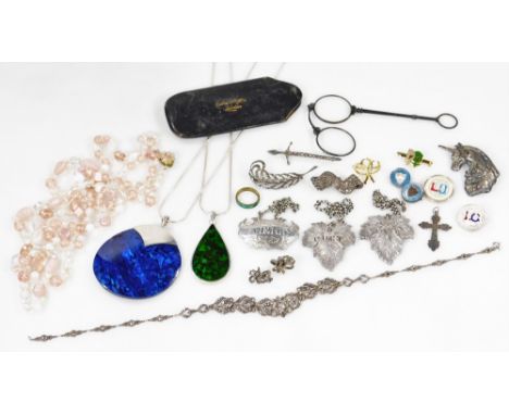 A quantity of costume jewellery, to include tie pin, gold plated brooch, marcasite  brooch, silver plated necklace, large cos