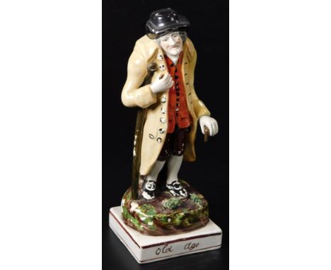 An early 19thC Staffordshire pottery figure Old Age, the male figure with a crutch and a walking stick, c1810, 20cm H.