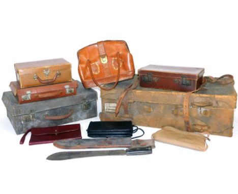 An early 20thC brown leather travel case, 37cm W, a larger travel trunk, handbag, other leather, pressed leather and other ha