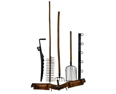Various vintage tools, basket gripe, 120cm H, various other tools apple fork, yoke, hanging wrought iron hanger, etc.  (a qua