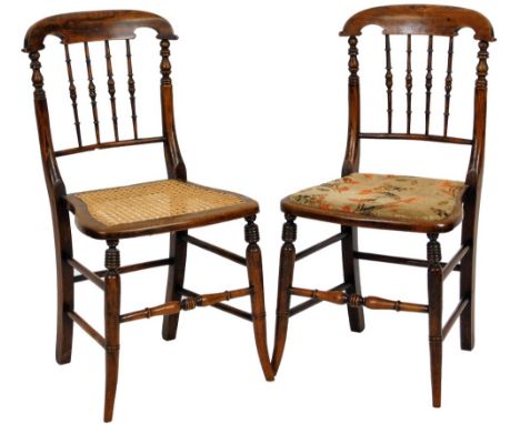 A harlequin pair of late 19thC country chairs, with comb top, spindle backs, shaped seats and front cylindrical sabre legs, o
