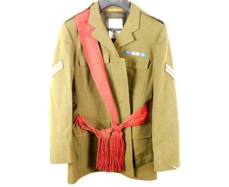 A 20thC green army uniform jacket, size 182, 87cm H.