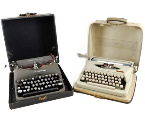An early 20thC Remington typewriter, in grey metal with articulated keys, 29cm W, in fitted case, and a further typewriter.  