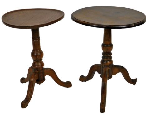 A 20thC oak occasional table, the circular dished top on a baluster column terminating on tripod base, 57cm H, 41cm Dia. and 