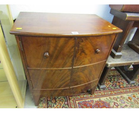 ANTIQUE MAHOGANY BOW FRONT COMMODE CUPBOARD, converted twin cupboard doors with wooden knop handles, 24" width 