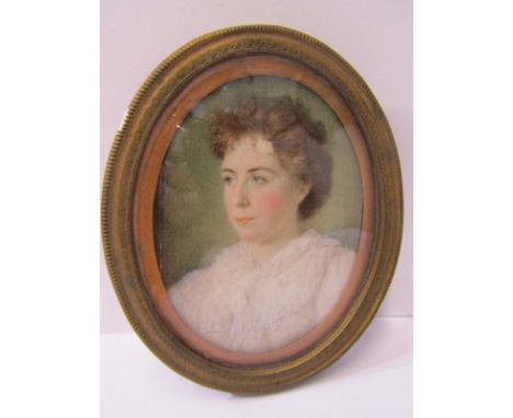 OVAL PORTRAIT MINIATURE, "Portrait of Young Lady in Lace Blouse" in brass oval frame 